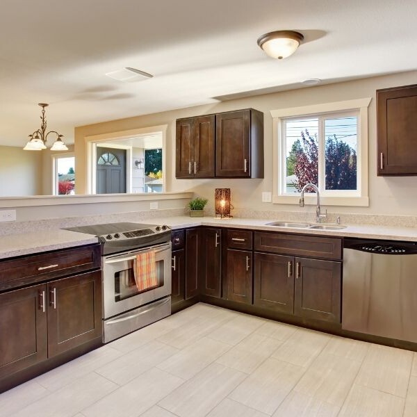 Ways To Incorporate Dark-Stained Cabinets Into Your Kitchen